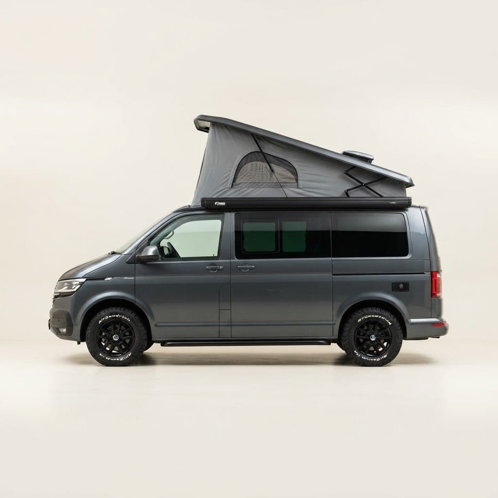 Campervan with its pop-top roof raised